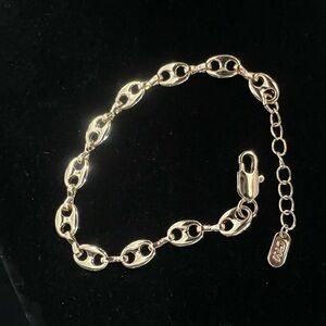 Gold-plated puffed mariner link bracelet.